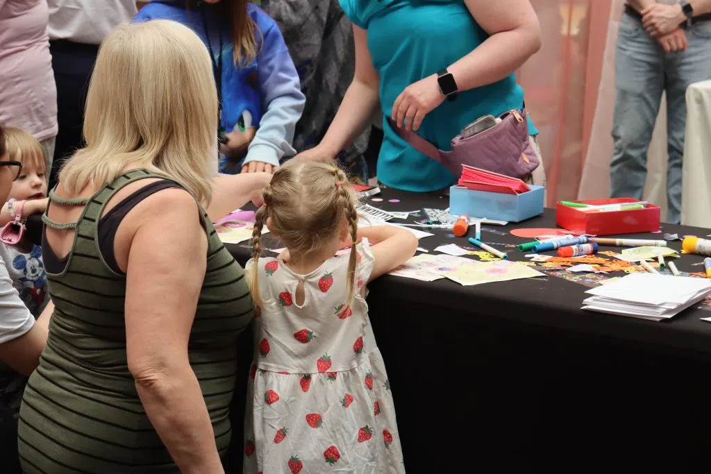 A Mother and her child making a card at the Love You Mama event inside West Edmonton Mall (Photo Credits - Daniel Barker-Tremblay)