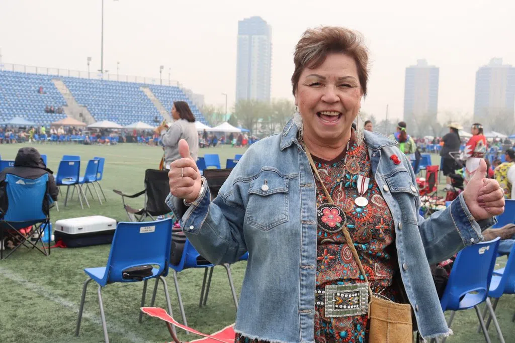 Elizabeth Betty Letendra, Organizer of the Ben Calf Traditional Pow Wow giving the thumbs up at the 40th annual Pow Wow (Photo Credits - Daniel Barker-Tremblay)