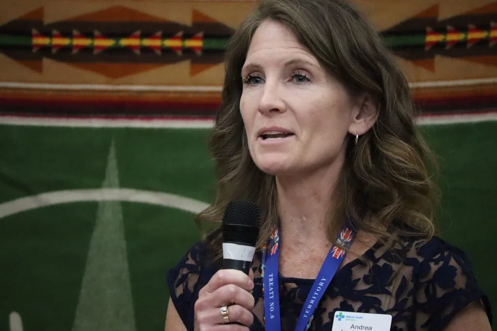 Andrea Thain Liptak, Senior Operating Officer for Rural Acute Care, Allied Health, Primary Care and Indigenous Health in AHS Central Zone speaking at the flag raising event in Wetaskiwin Hospital and Care Centre (Photo Credits - Daniel Barker-Tremblay)