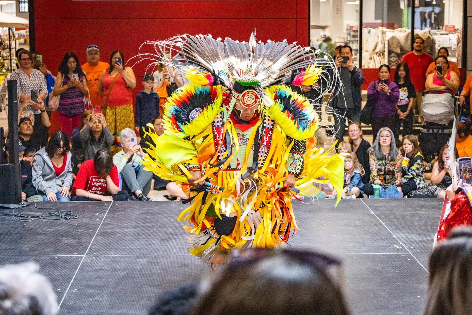 Ceremonial Dancer performing in front of the Treaty Six Document display (Photo Submitted)