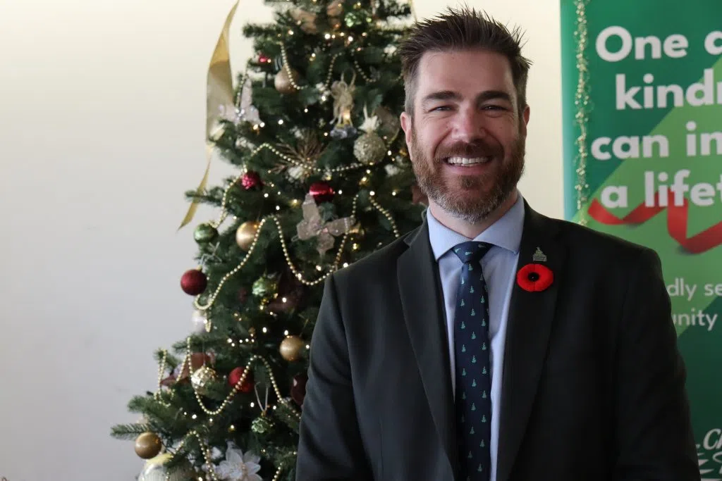 Adam Zawaduik, executive director of the Christmas Bureau all smiles at the 2024 Gingerbread Competition (Photo Credits - Daniel Barker-Tremblay)