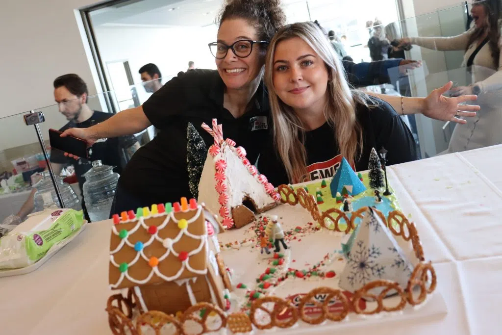 CFWE's Brooklin (Right) and 89.3 The Raven's Shannon (Left) all smiles with their Gingerbread creation at the Christmas Bureau Gingerbread Competition (Photo Credits - Daniel Barker-Tremblay)