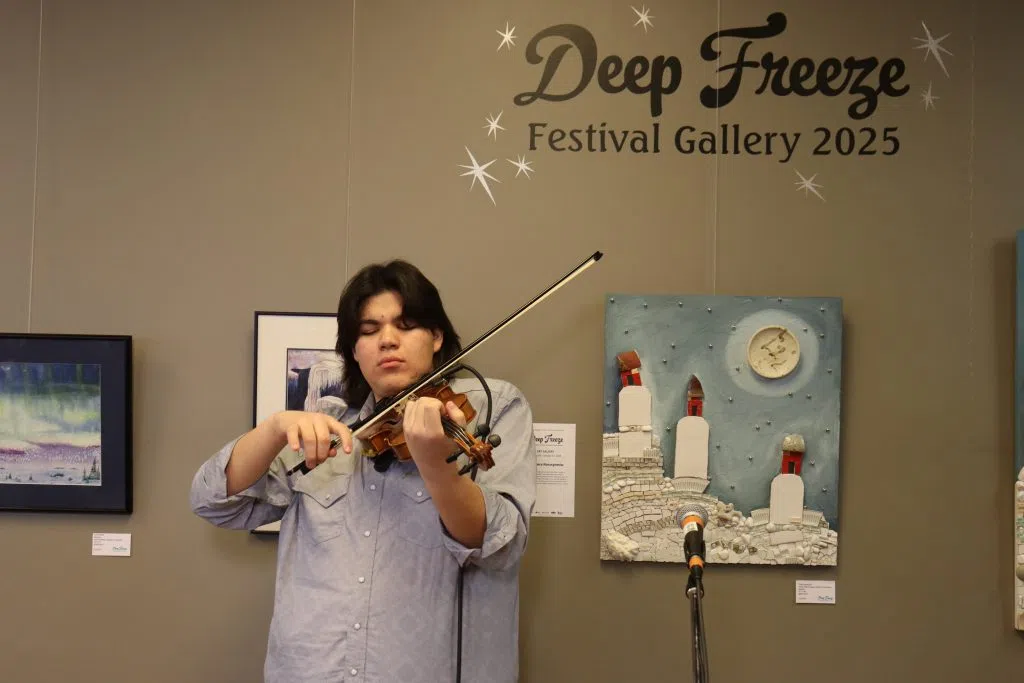 Fiddler Zach Willier performing at the Deep Freeze Kickoff event