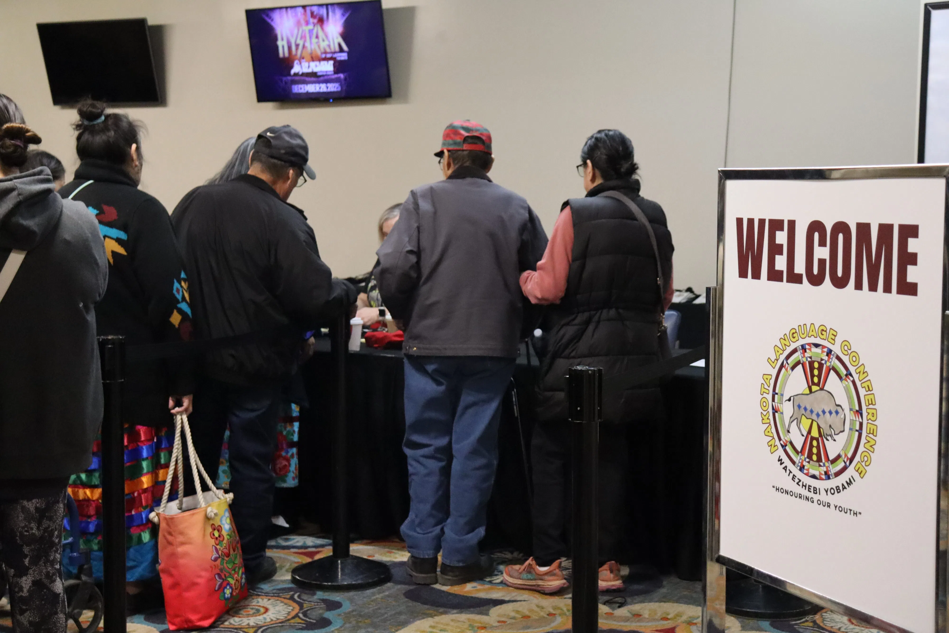 Community members lined up for the Nakota Language Conference inside the River Cree Resort and Casino (Photo Credits - Daniel Barker-Tremblay)