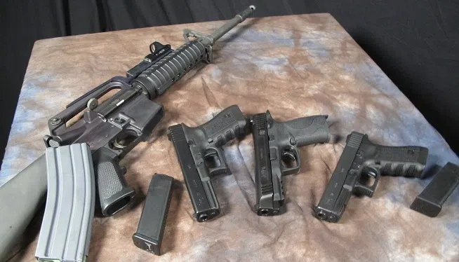 3 HANDGUNS, 1 RIFLE. (2) GLOCK 17-9MM. (1) SMITH AND WESSON M/P-.45CAL. (1) BUSHMASTER XM15-E2S-.223CAL RIFLE.
