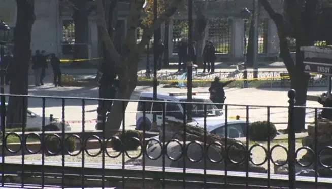 Security forces and emergency personnel secure the scene of explosion in Istanbul, Turkey.