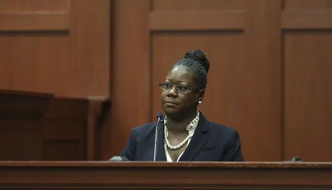 Trayvon Martin's mother, Sybrina Fulton, takes the stand during George Zimmerman's trial in Seminole circuit court in Sanford, Fla. Friday, July 5, 2013.