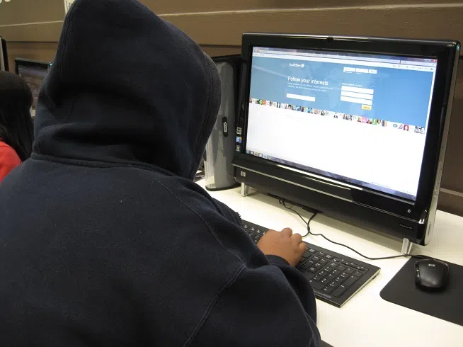 Eighth-grade history teacher Enrique Legaspi has his students "tweet" answers to him during class at Hollenbeck Middle School using their own handheld devices or school computers. He says using Twitter has saved on paper costs, increased student participation, and has made him a more effective teacher.