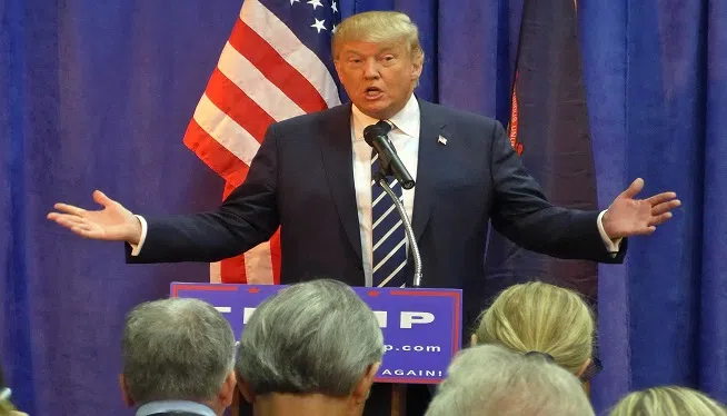 Donald Trump speaks to the media at a Lincoln Day event sponsored by the Republican parties of Genesee and Saginaw counties, MI.