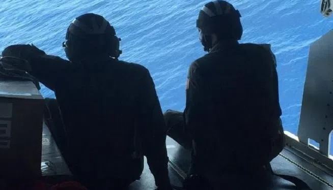 US Coast Guard crews continue searching thru the night for missing boys.