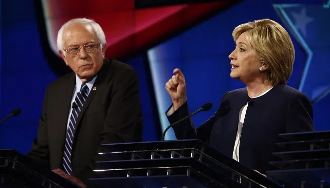 Bernie Sanders and Hillary Clinton at the CNN Democratic Debate at the Wynn Hotel in Las Vegas, Tuesday, October 13, 2015.