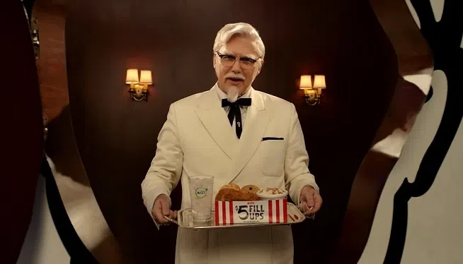 Three months after KFC reintroduced "Colonel Sanders," they have a new actor portraying him - Norm MacDonald. The late founder of the fast food chain had been played over the summer by "Saturday Night Live" announcer and former cast member Darrell Hammond.