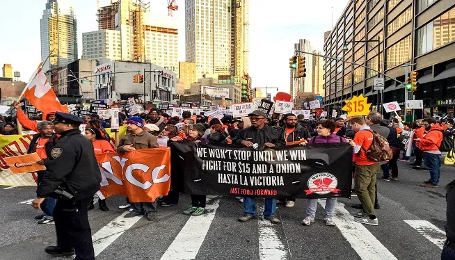 On Wednesday, July 21, 2015 the wage board is set to vote on New York Governor Andrew Cuomo's proposal to raise the state's minimum wage for fast food workers to $15 an hour. The meeting will be held in New York City at 2.30 pm. This picture is of fast food workers protest earlier this year.