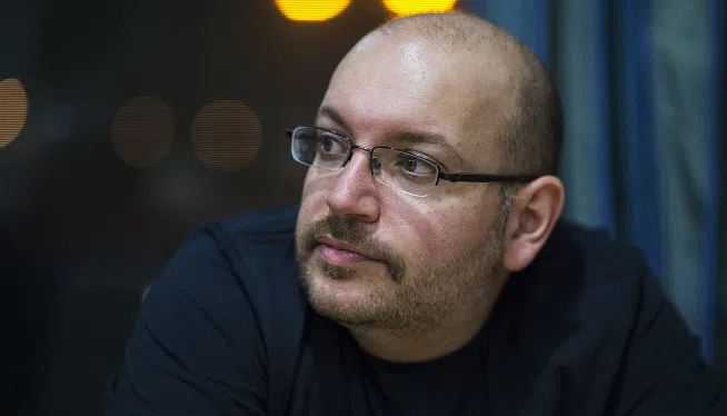 MANDATORY CREDIT: Jabin Botsford/The Washington Post Washington Post correspondent Jason Rezaian listens as his family and friends discuss what their future plans are at the Landstuhl Fisher House at the U.S. military medical center at Landstuhl where he and two other Americans released from an Iranian prison were inspected in Landstuhl, Germany on Tuesday, January 19, 2016.