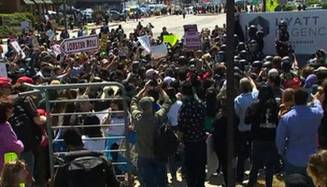 Scores of demonstrators descended on the California Republican convention Friday to protest Donald Trump, who was expected to speak at the event later in the day.