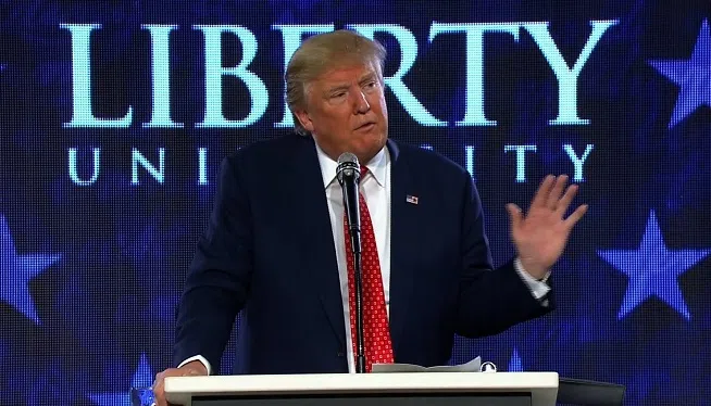 Donald Trump tripped over himself on Monday as he attempted to quote from the Bible to connect with the crowd of students at one of the most prominent Christian university in the country. "Two Corinthians, 3:17, that's the whole ballgame," Trump said, drawing laughter from the crowd of students at Liberty University, who knew Trump was attempting to refer to "Second Corinthians."