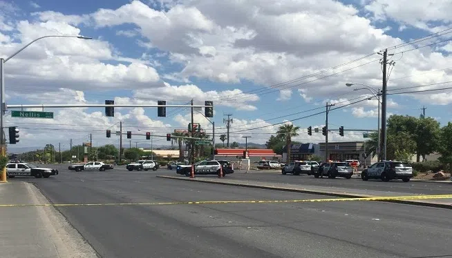 A man with a semiautomatic handgun ambushed two officers who'd stopped their patrol car at a traffic light in Las Vegas on Sunday, September 6, 2015, police said. Police haven't released the identity of the suspect, who was later arrested by the officers.