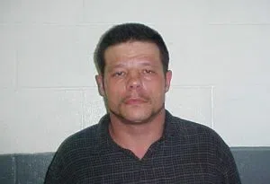 This June 8, 2010 photo provided by the Kay County Detention Center shows Michael Vance. Authorities are searching for Vance, who is suspected in a double slaying and accused of shooting and wounding multiple police officers near Oklahoma City on Sunday, Oct. 23, 2016. (Kay County Detention Center via AP)