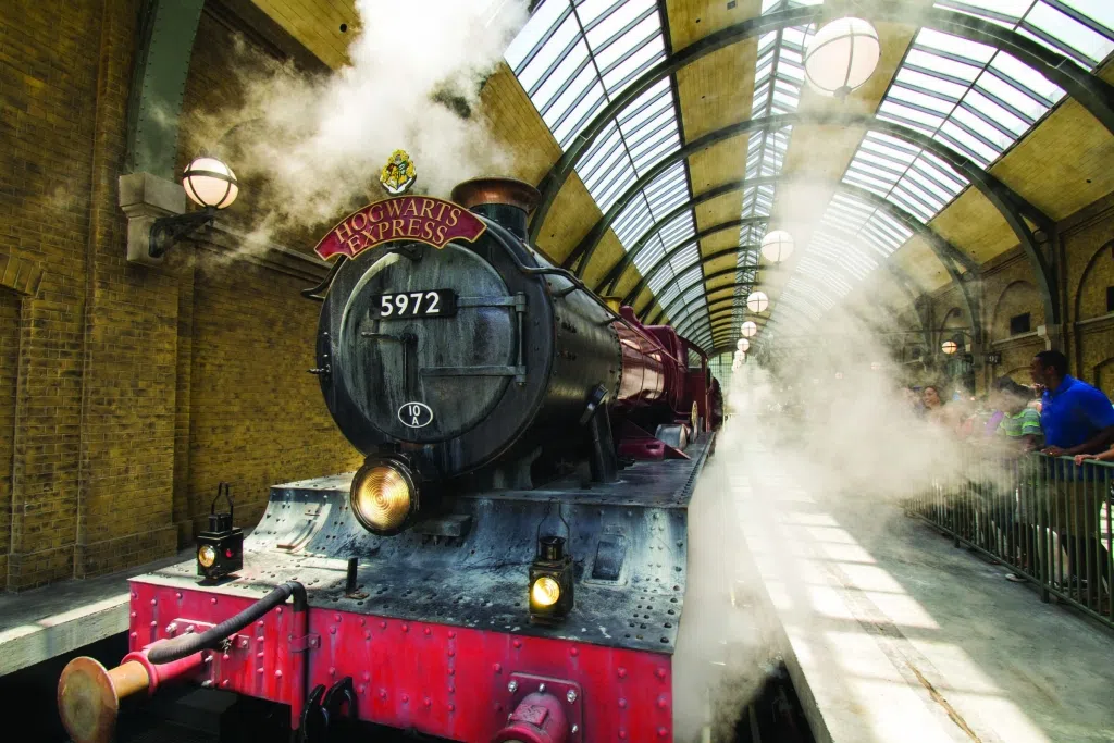 Advertising Wizarding World of Harry Potter Diagon Alley WWoHP DA at Universal Studios Florida USF Kings Cross Platform 9 3/4 Guests enter/exit, board train at platform conductors, porters JIB