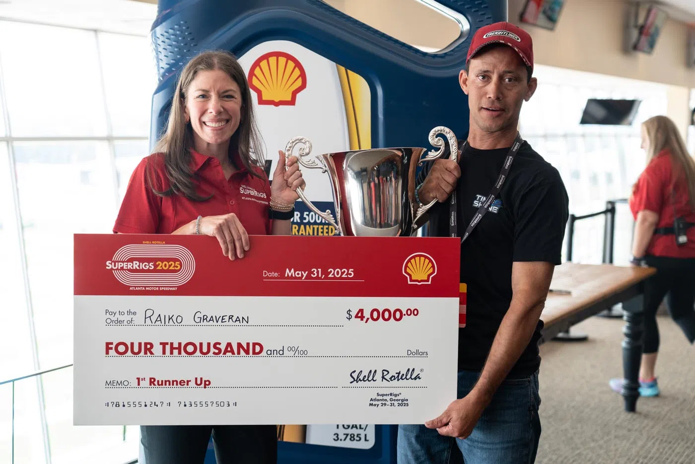 Julie Wright of Shell Rotella with Raiko Graveran, Best of Show 1st Runner up at the 43rd Annual Shell Rotella® SuperRigs® competition held May 29-31 at Atlanta Motor Speedway in Hampton, Ga.