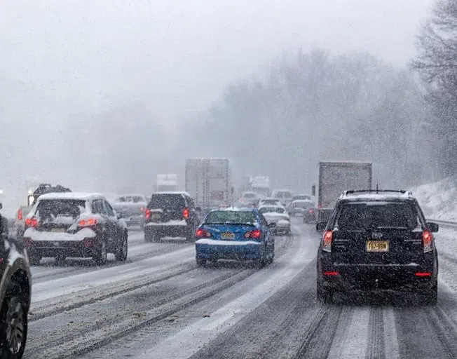 Cars Driving in Snow