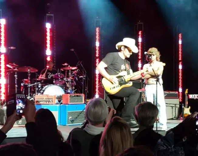 Brad Paisley, Will Ferrell and Chad Smith on stage.