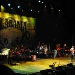 Randy Owen, Teddy Gentry and members of the Alabama Band on stage