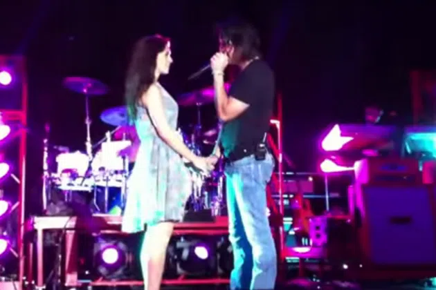 Jake Owen proposes to Lacey for all the world to see during a performance. From: youtube