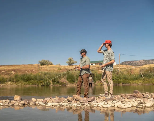 Luke Bryan and his nephew Til fishing