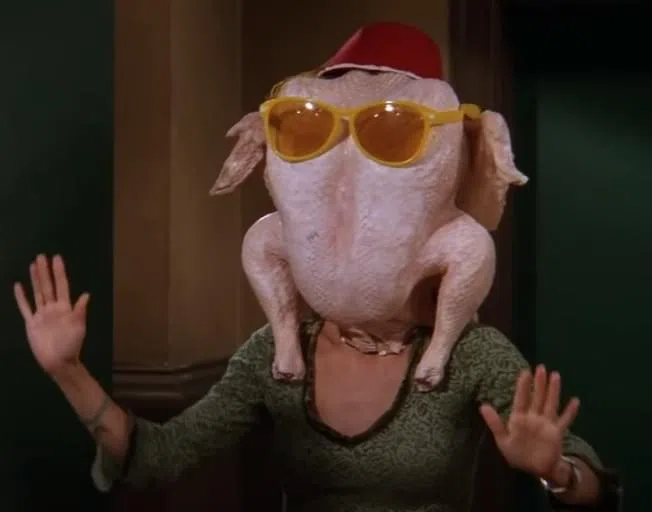 Monica With Turkey on her head