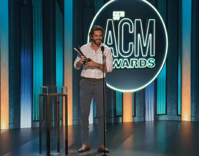 Thomas Rhett accepting the ACM Entertainer of the Year Award
