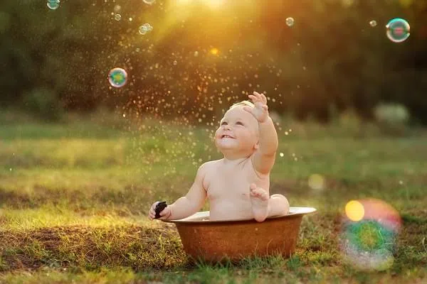 baby in a bucket