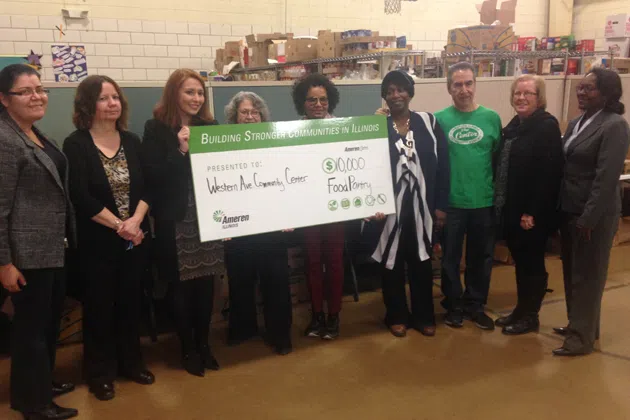 Ameren Illinois presents a $10,000 check to the Western Avenue Community Center Thursday. (Joe Ragusa/WJBC)