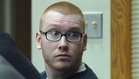 Nicholas Compton looks back at family members after he was handed a sentence of natural life in prison for the death of three-year-old Robbie Cramer in March of 2013. (Pool photo)