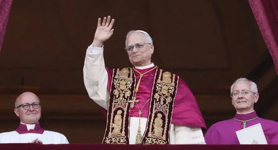 Pope Leo XIV appears on the central loggia of St. Peter's Basilica after being chosen the 267th pontiff of the Roman Catholic Church, at the Vatican, Thursday, May 8, 2025. (AP Photo/Alessandra Tarantino)