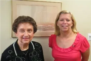 Carol Flessner, executive director of the Livingston County Mental Health Board, standing with her replacement, Christine Myers. (Photo Courtesy of Cynthia Grau)