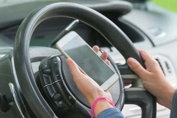 Using phone while driving the car. Risky driving behaviors concept