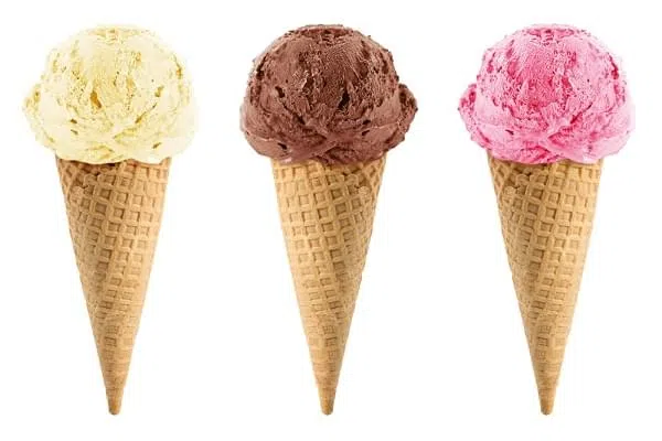 Chocolate, vanilla and strawberry Ice cream in the cone on white background with clipping path.