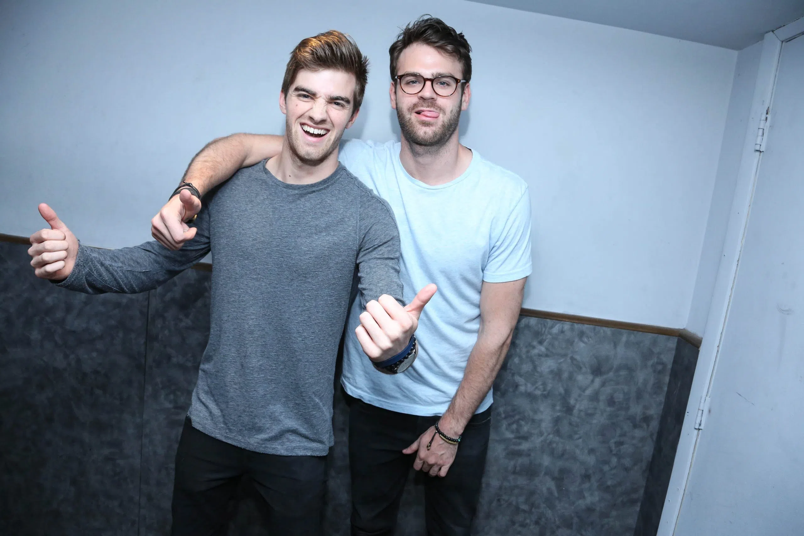 NEW YORK, NY - APRIL 14: NYC based DJs Andrew Taggart and Alex Pall, of The Chainsmokers backstage at the MTV Artist To Watch Event With Flume and The Chainsmokers at Highline Ballroom on April 14, 2014 in New York City. (Photo by Rob Kim/Getty Images)