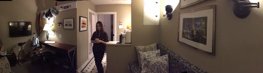 Corey Towner in her Arcade micro loft. Photo by Kim Kalunian, WPRO News.