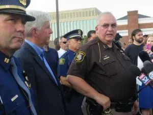 Berrien County Sheriff Paul Bailey addresses the media on Monday, July 11, 2016, in St. Joseph, Mich. A prisoner was being moved moved from a holding cell at the Berrien County Courthouse when he disarmed an officer shot and killed two bailiffs Monday, before officers killed the gunman, the sheriff said. A deputy sheriff and a civilian were also shot and wounded officials reported. (AP Photo/David Eggert)