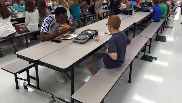 Travis Rudolph and Boy at Lunch – Facebook