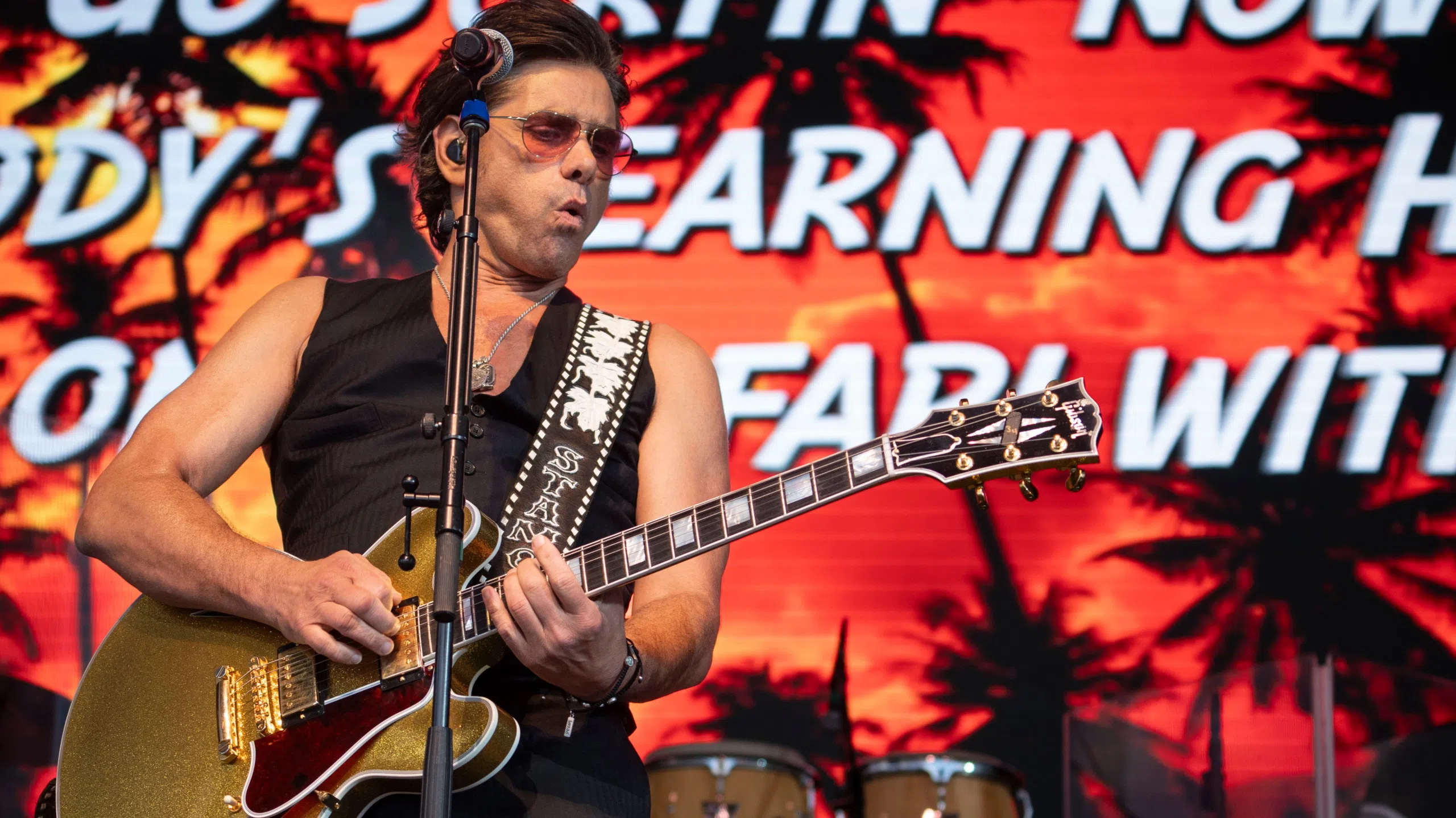 John Stamos Unveils Full House Tattoo at Riot Fest