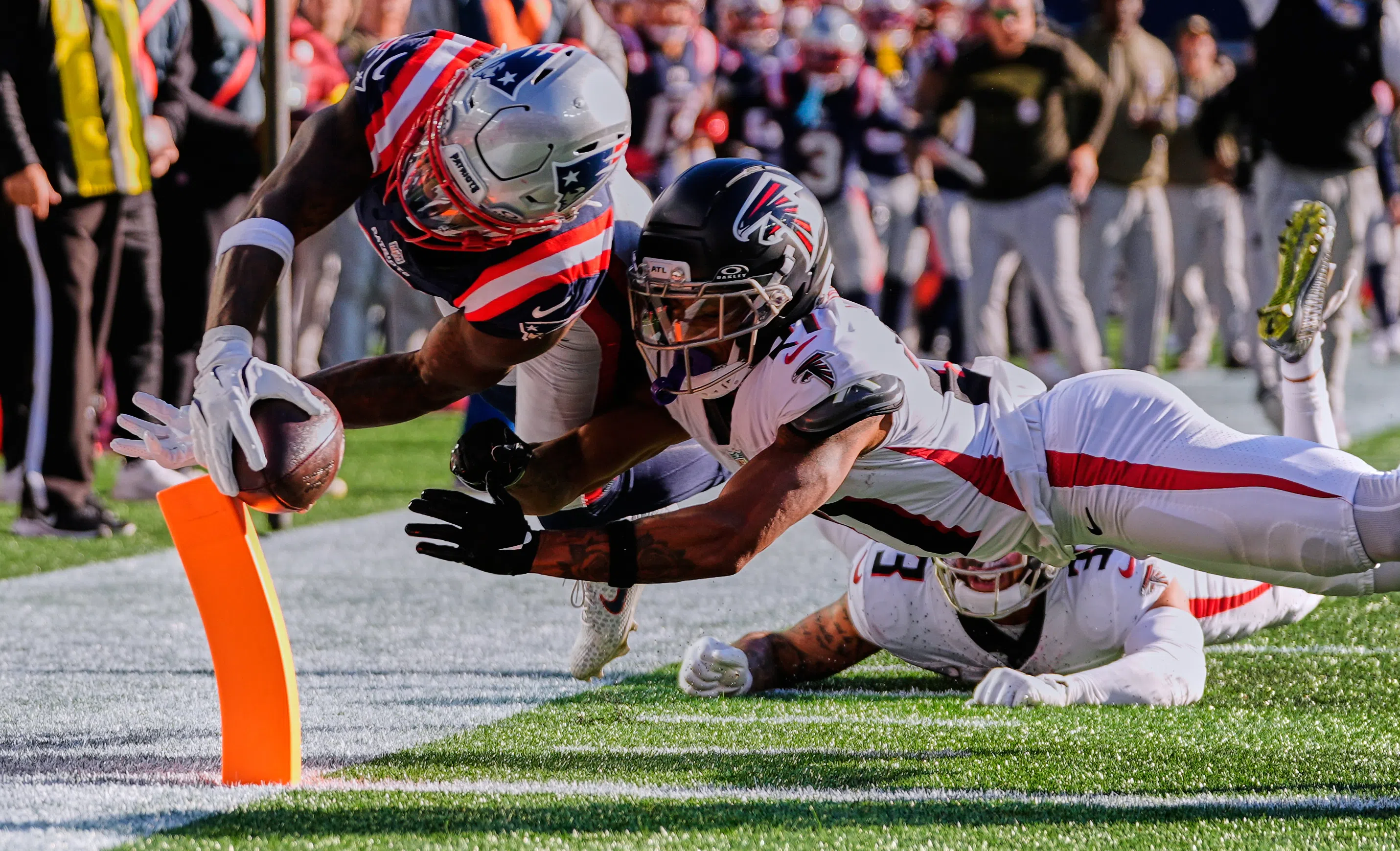 New England Patriots wide receiver Stefon Diggs (8) scores a touchdown against Atlanta Falcons cornerback Mike Hughes (21)