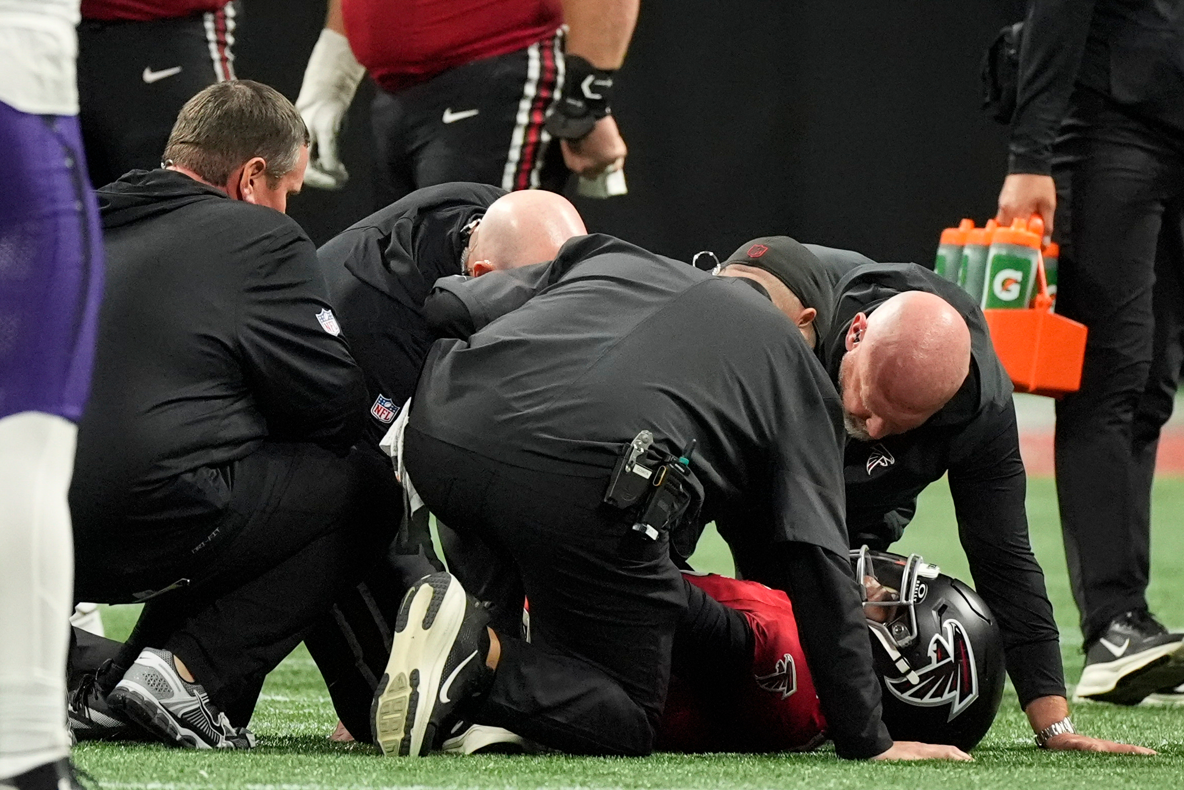 Atlanta Falcons quarterback Michael Penix Jr. (9) lies injured against the Baltimore Ravens
