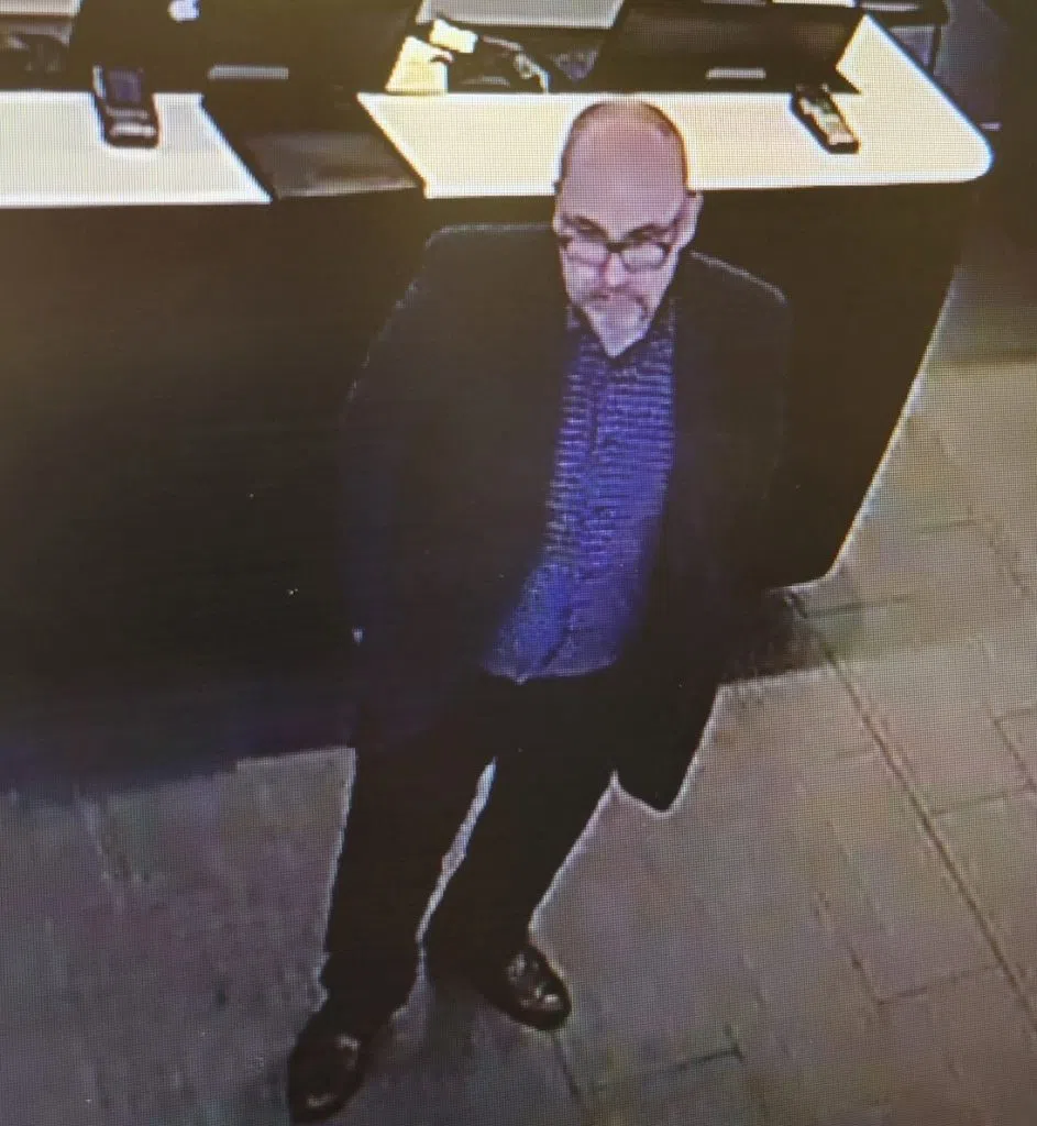 Surveillance footage of a suspect in identity theft. RCMP supplied images