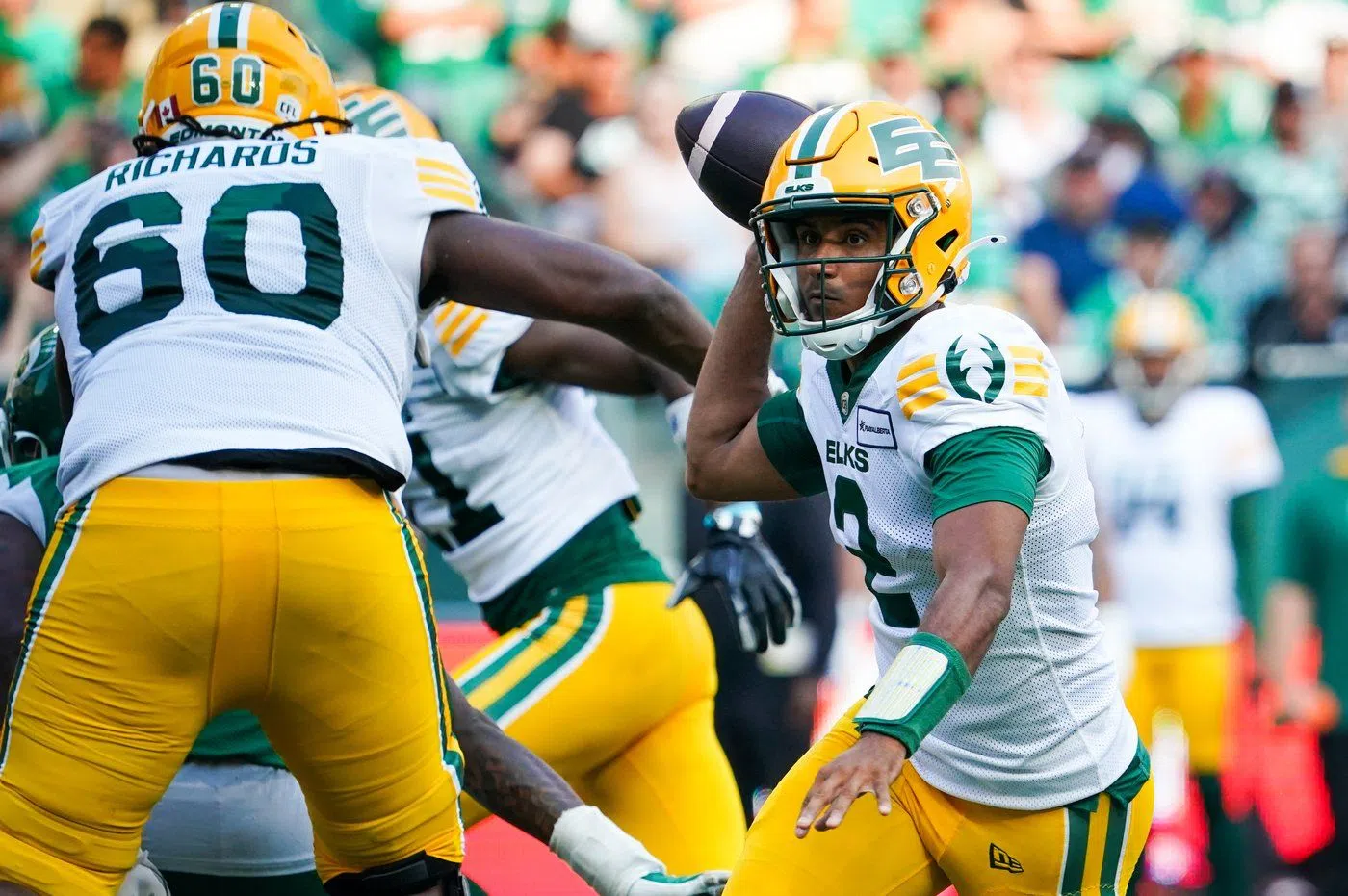 Edmonton Elks quarterback Tre Ford (2) winds up to throw against the Saskatchewan Roughriders during the first half of CFL football action in Regina, on Saturday, Aug. 3, 2024. THE CANADIAN PRESS/Heywood Yu