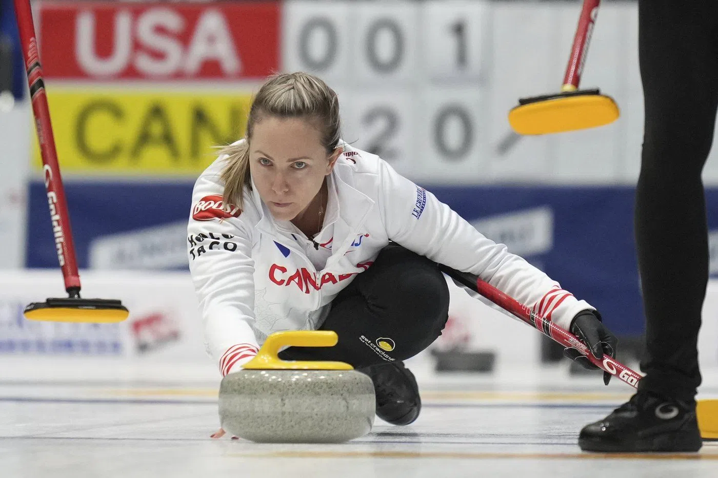 Canada's skip Rachel Homan releases the stone during the match against the United States at the World Women's Curling Championship in Uijeongbu, South Korea, Tuesday, March 18, 2025. THE CANADIAN PRESS/AP-Lee Jin-man