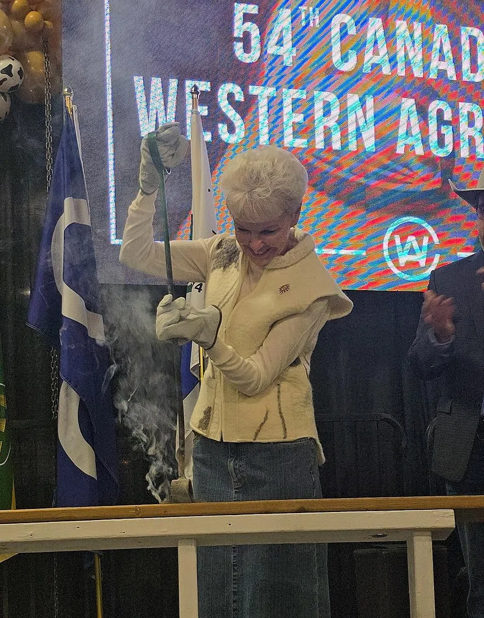 Lieutenant Governor Bernadette McIntyre burns the brand to mark the start of Canadian Western Agribition on Monday, November 24, 2025.Photo by Ryan Young