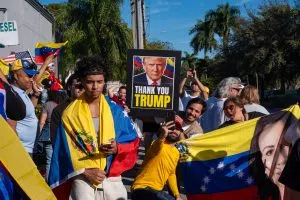 People celebrate after President Donald Trump announced Venezuelan President Nicolás Maduro had been captured 